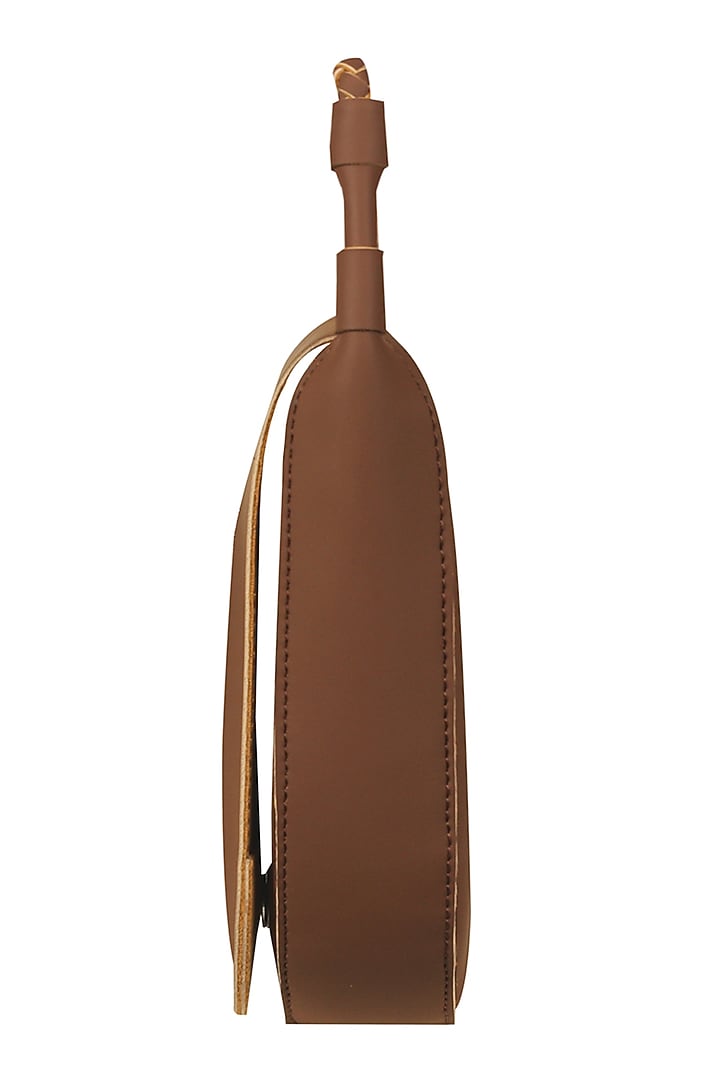 Rocky Road Brown Sling Bag With Button Closure by The House Of Ganges at Pernia's Pop Up Shop