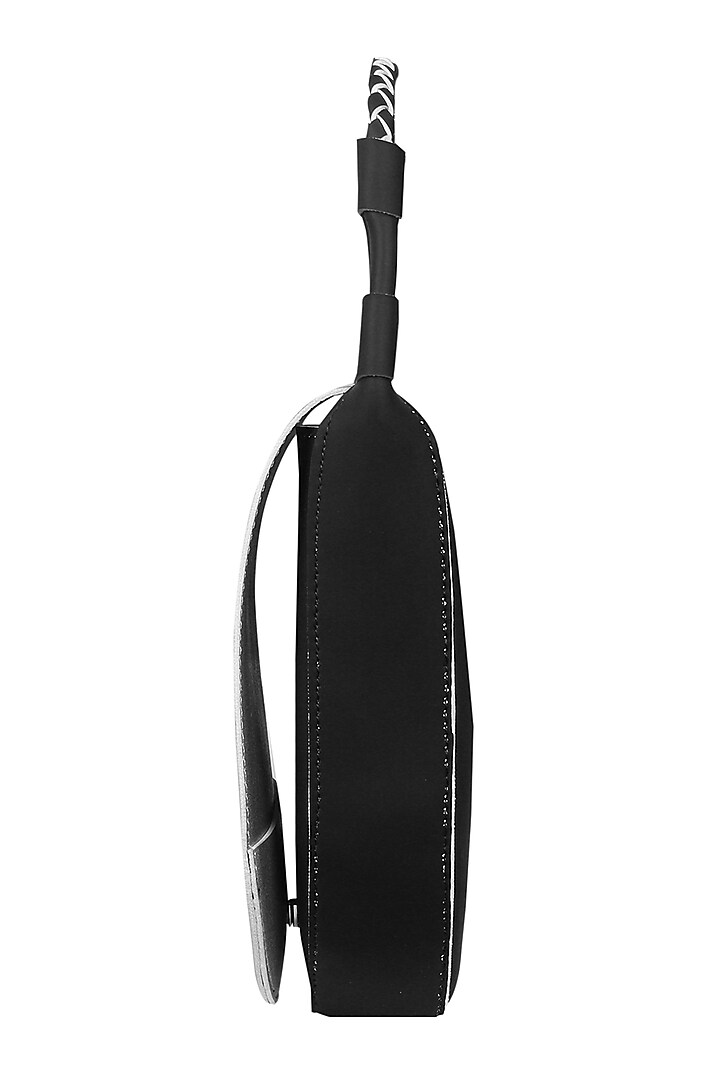 Pitch Black Sling Bag With Button Closure by The House Of Ganges at Pernia's Pop Up Shop