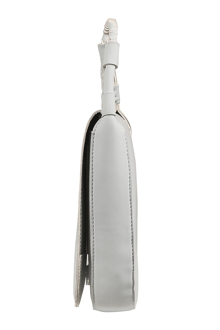 Ice White Sling Bag With Button Closure by The House Of Ganges at Pernia's Pop Up Shop