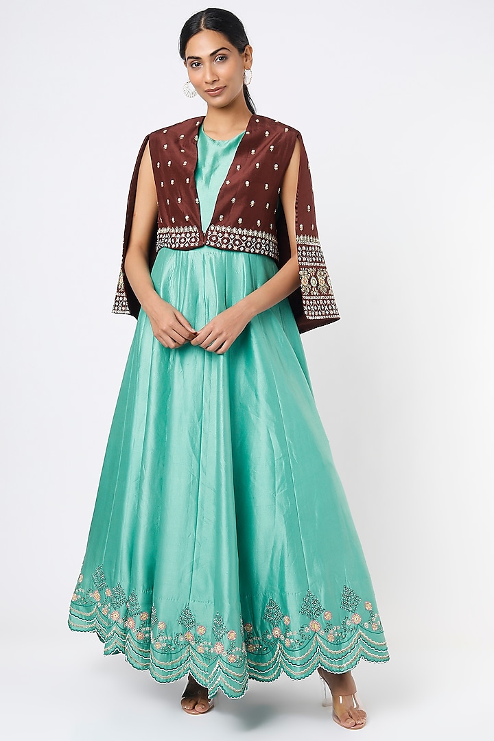 Sky Blue Embroidered Gown With Cape by THE HOUSE OF KOSH at Pernia's Pop Up Shop