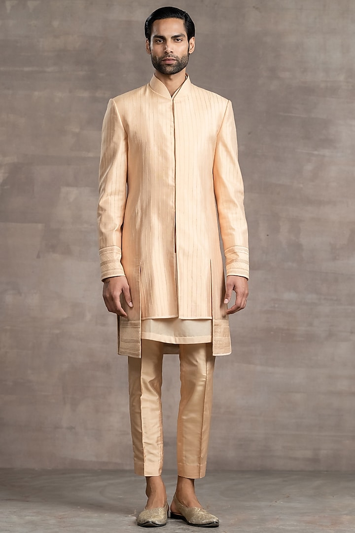Peach Textured Silk Overlapped Asymmetrical Sherwani Set by Tarun Tahiliani Men