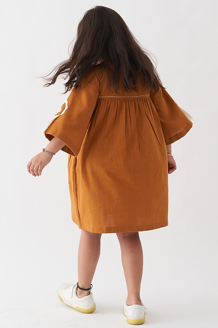 Rust Handwoven Cotton Dress For Girls by Three Kidswear at Pernia's Pop Up Shop