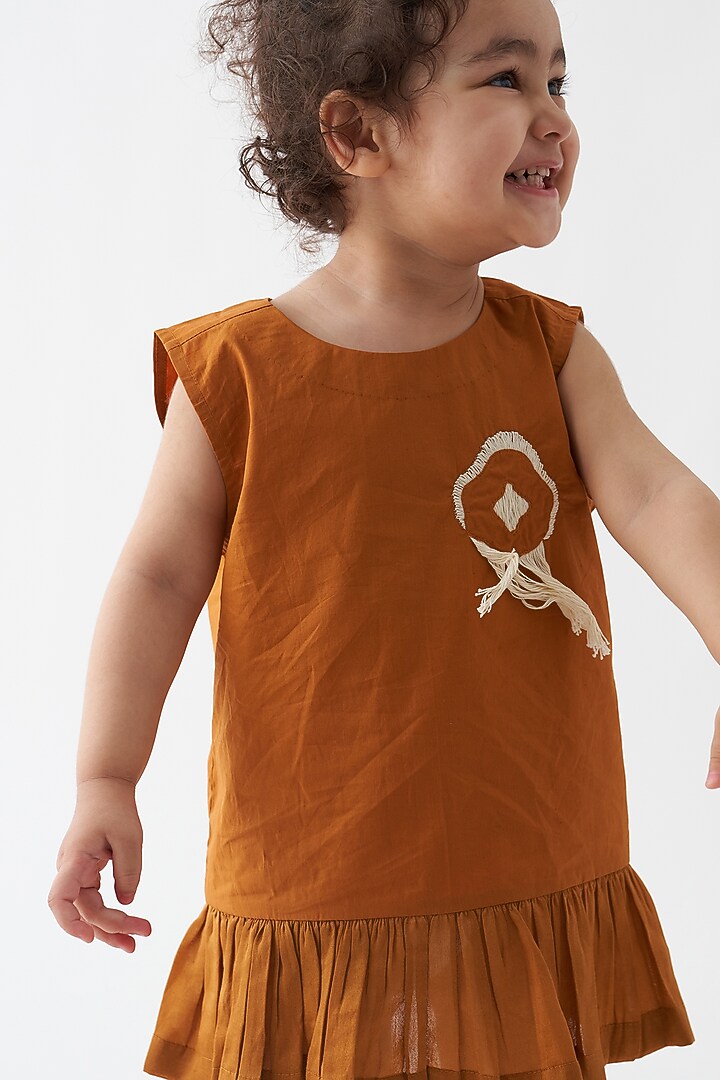 Rust Cotton Poplin Applique Pleated Dress For Girls by Three Kidswear at Pernia's Pop Up Shop