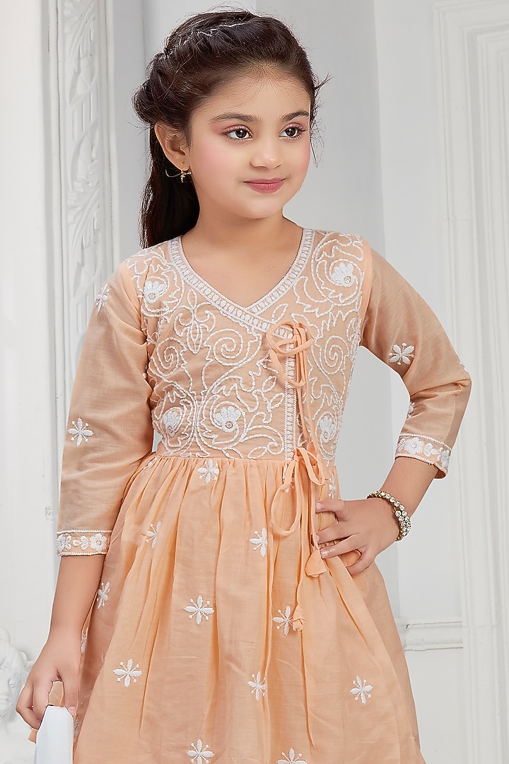 Peach Cotton Mulmul Thread Embroidered Sharara Set For Girls by TIAARNA at Pernia's Pop Up Shop