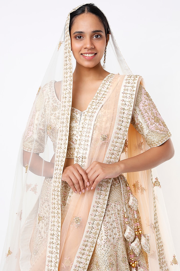 Cream Raw Silk Embroidered Wedding Lehenga Set by Angad Singh at Pernia's Pop Up Shop