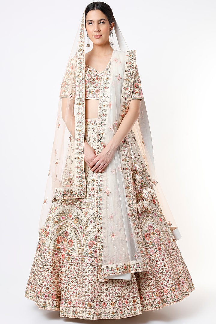 Cream Raw Silk Embroidered Bridal Lehenga Set by Angad Singh at Pernia's Pop Up Shop