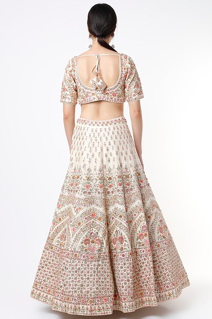 Cream Raw Silk Embroidered Bridal Lehenga Set by Angad Singh at Pernia's Pop Up Shop
