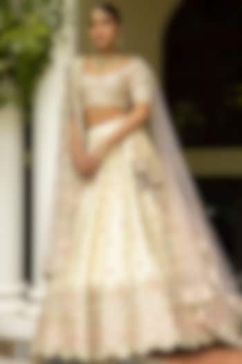 Ivory Raw Silk Embroidered Wedding Lehenga Set by Angad Singh at Pernia's Pop Up Shop
