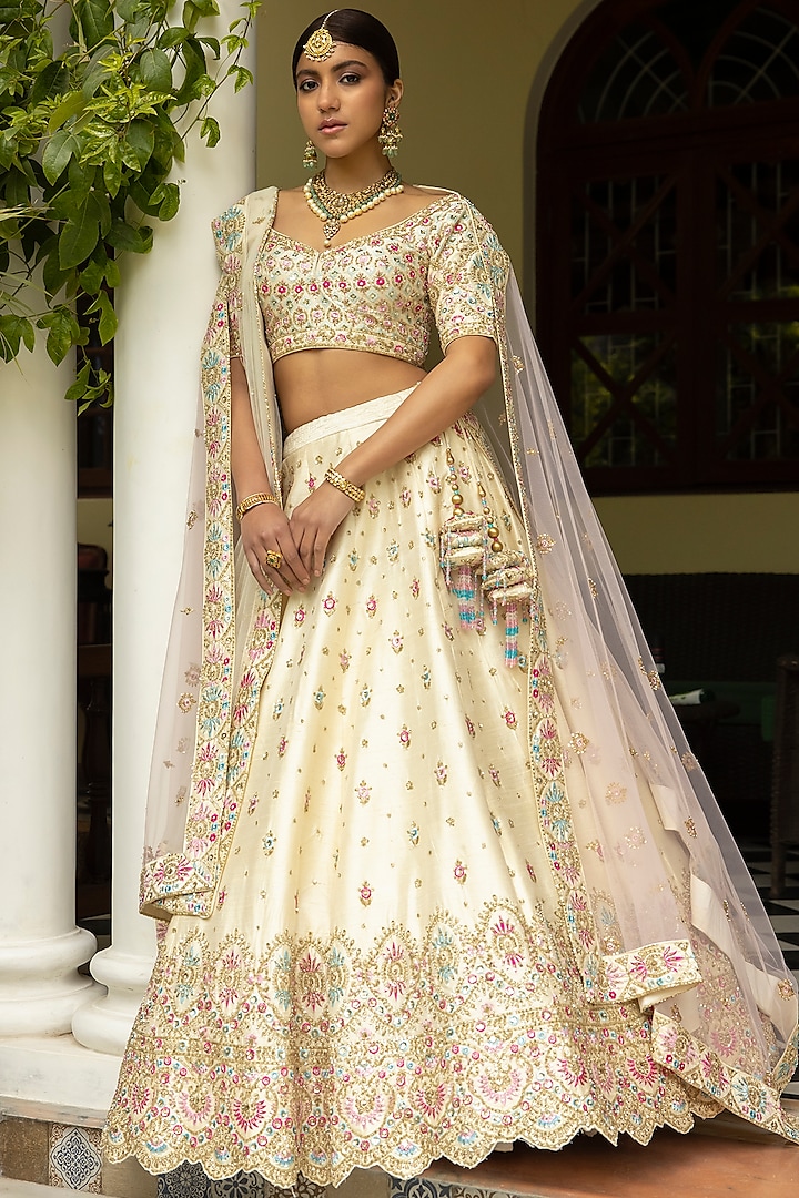 Ivory Raw Silk Embroidered Wedding Lehenga Set by Angad Singh at Pernia's Pop Up Shop