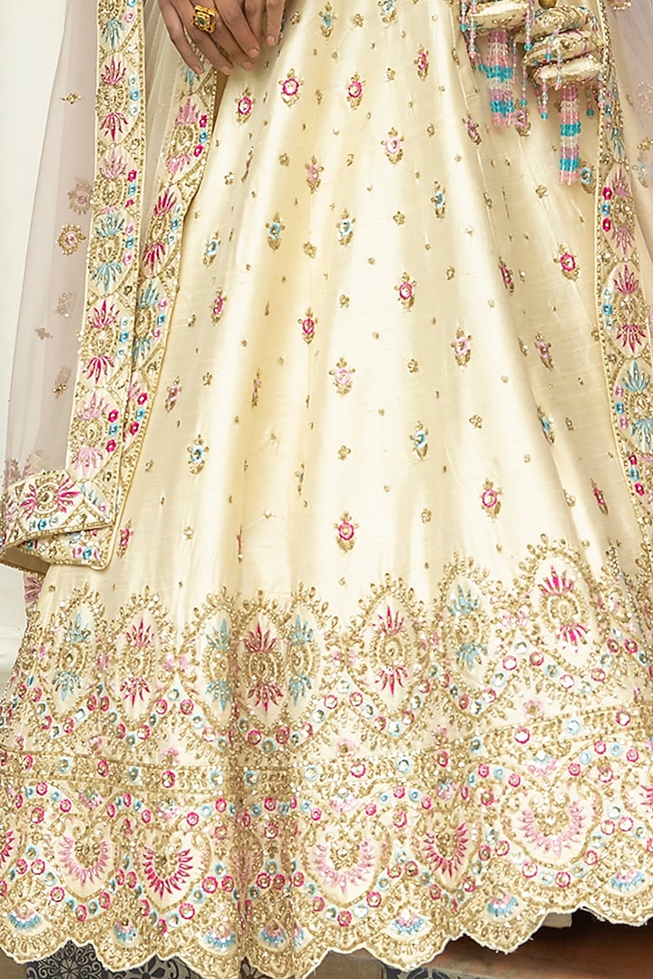 Ivory Raw Silk Embroidered Wedding Lehenga Set by Angad Singh at Pernia's Pop Up Shop