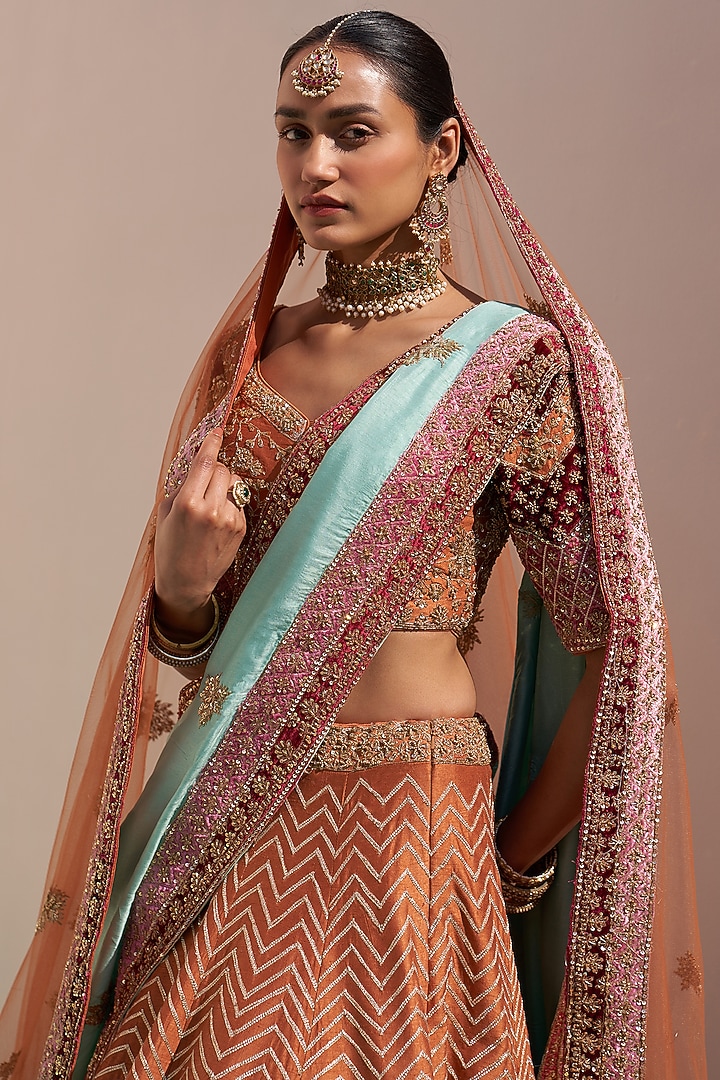 Rust Raw Silk Applique mbroidered Bridal Lehenga Set by Angad Singh at Pernia's Pop Up Shop