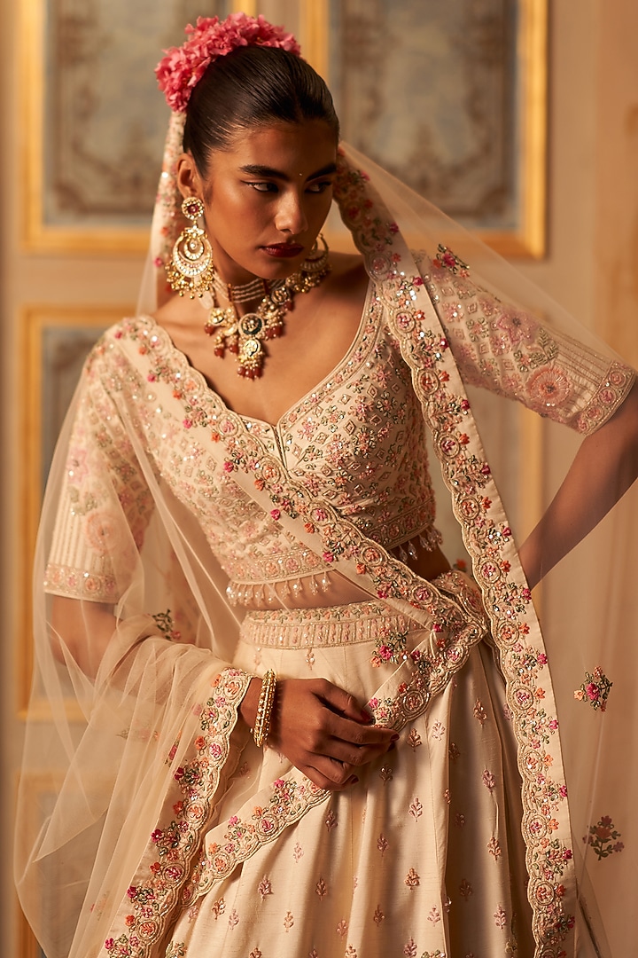 Ivory Raw Silk Embroidered Bridal Lehenga Set by Angad Singh at Pernia's Pop Up Shop