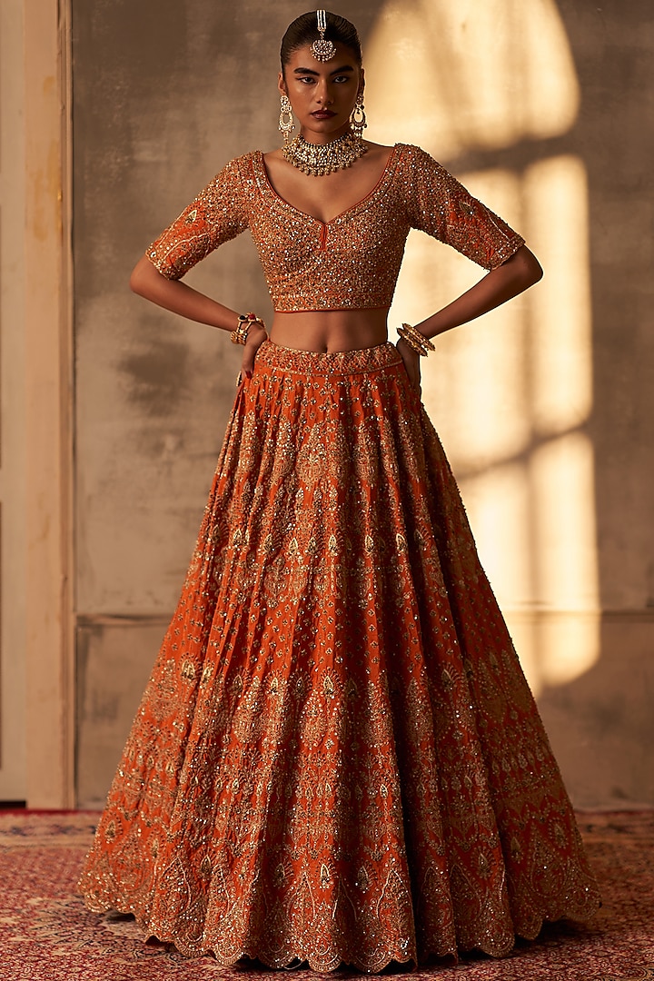 Rust Raw Silk Embroidered Bridal Lehenga Set by Angad Singh at Pernia's Pop Up Shop