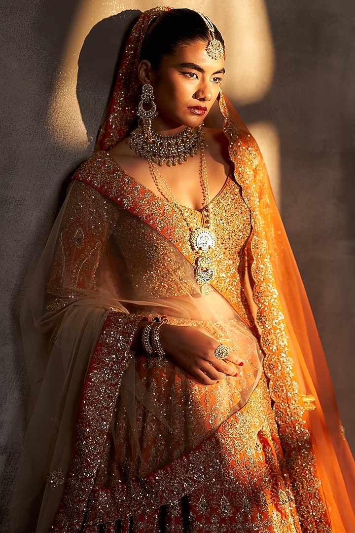 Rust Raw Silk Embroidered Bridal Lehenga Set by Angad Singh at Pernia's Pop Up Shop