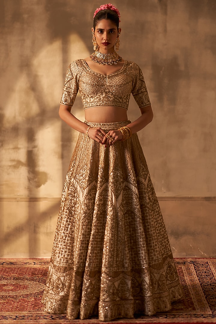 Ivory Raw Silk Embroidered Bridal Lehenga Set by Angad Singh at Pernia's Pop Up Shop