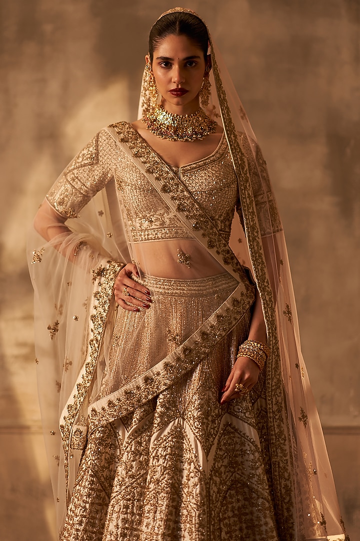 Ivory Raw Silk Embroidered Bridal Lehenga Set by Angad Singh at Pernia's Pop Up Shop