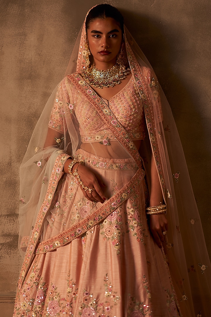 Peach Raw Silk Embroidered Wedding Lehenga Set by Angad Singh at Pernia's Pop Up Shop