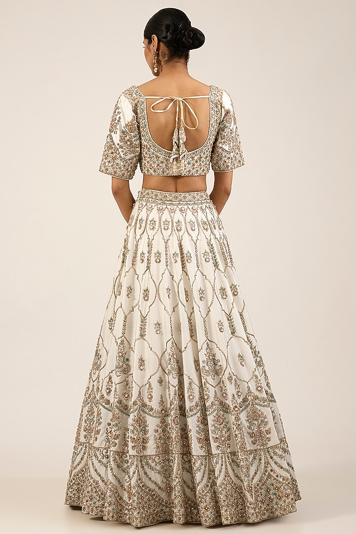 Ivory Raw Silk Embroidered Bridal Lehenga Set by Angad Singh at Pernia's Pop Up Shop