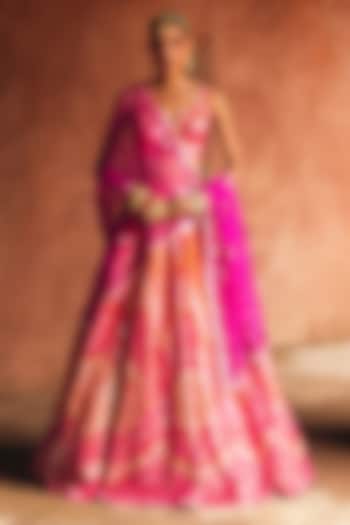 Rani Pink & Rust Raw Silk Mirror Embroidered Wedding Lehenga Set by Angad Singh at Pernia's Pop Up Shop
