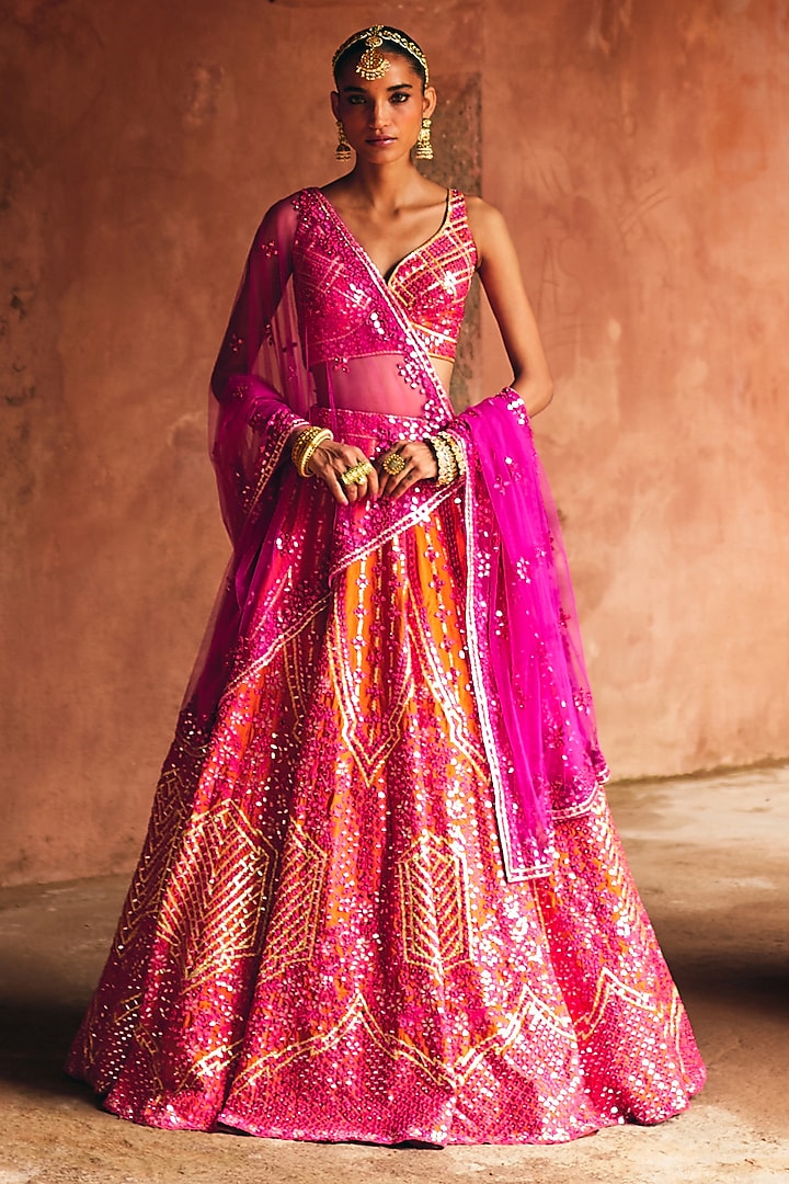 Rani Pink & Rust Raw Silk Mirror Embroidered Wedding Lehenga Set by Angad Singh at Pernia's Pop Up Shop