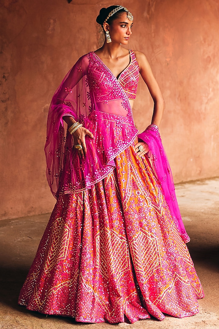 Rani Pink & Rust Raw Silk Mirror Embroidered Wedding Lehenga Set by Angad Singh at Pernia's Pop Up Shop