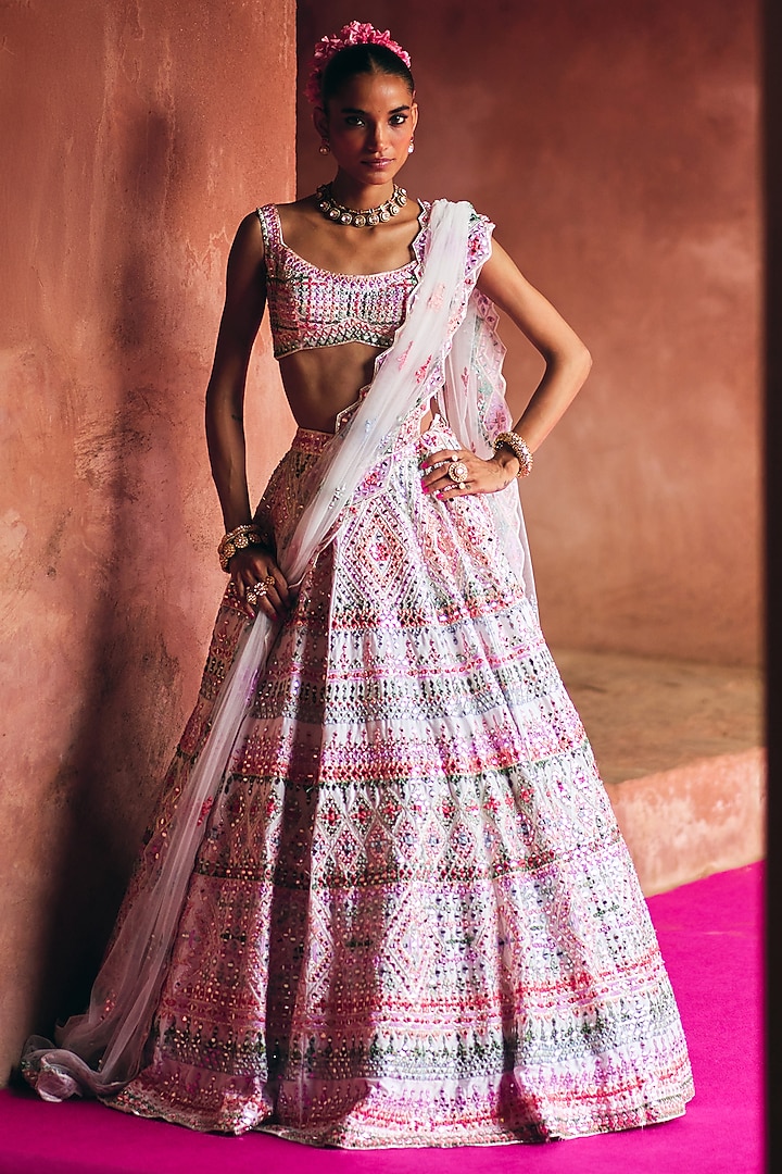 Ivory Raw Silk Mirror Embroidered Wedding Lehenga Set by Angad Singh at Pernia's Pop Up Shop