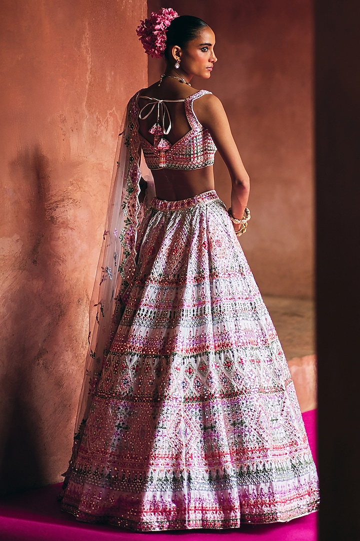 Ivory Raw Silk Mirror Embroidered Wedding Lehenga Set by Angad Singh at Pernia's Pop Up Shop