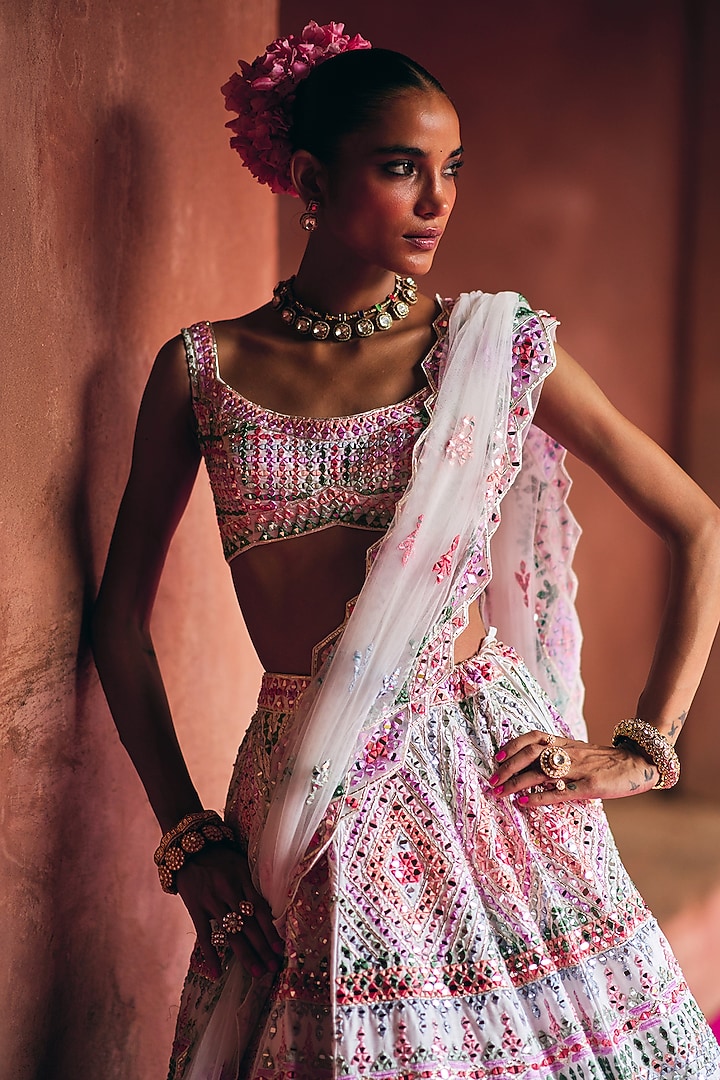Ivory Raw Silk Mirror Embroidered Wedding Lehenga Set by Angad Singh at Pernia's Pop Up Shop