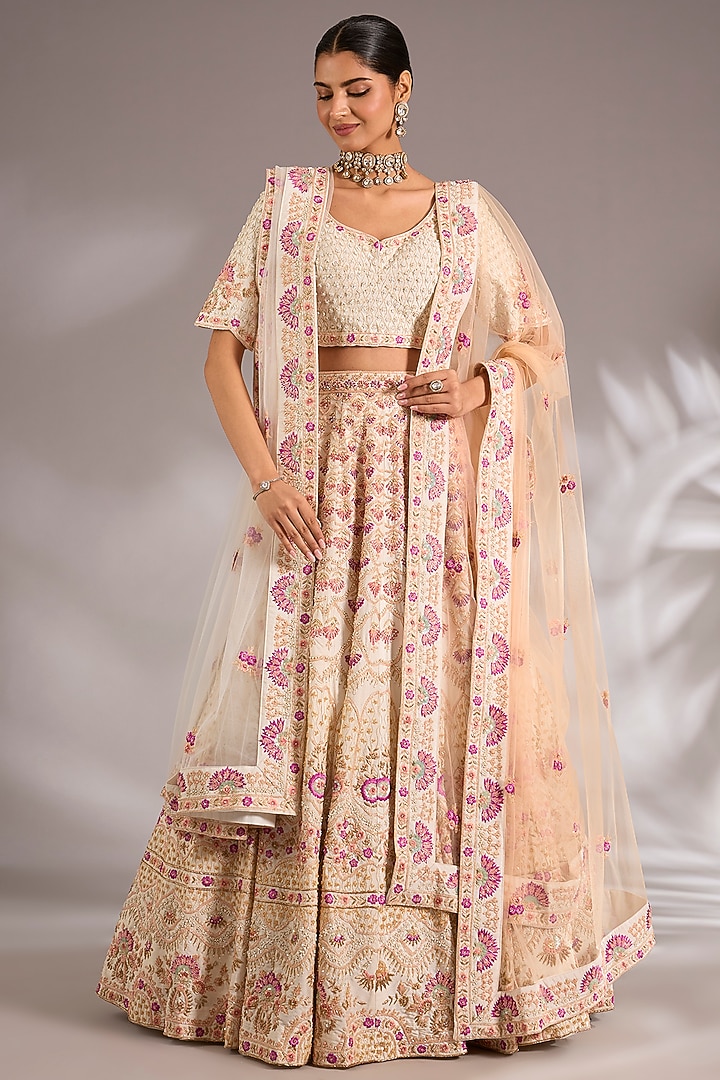 Ivory Raw Silk Embroidered Bridal Lehenga Set by Angad Singh at Pernia's Pop Up Shop