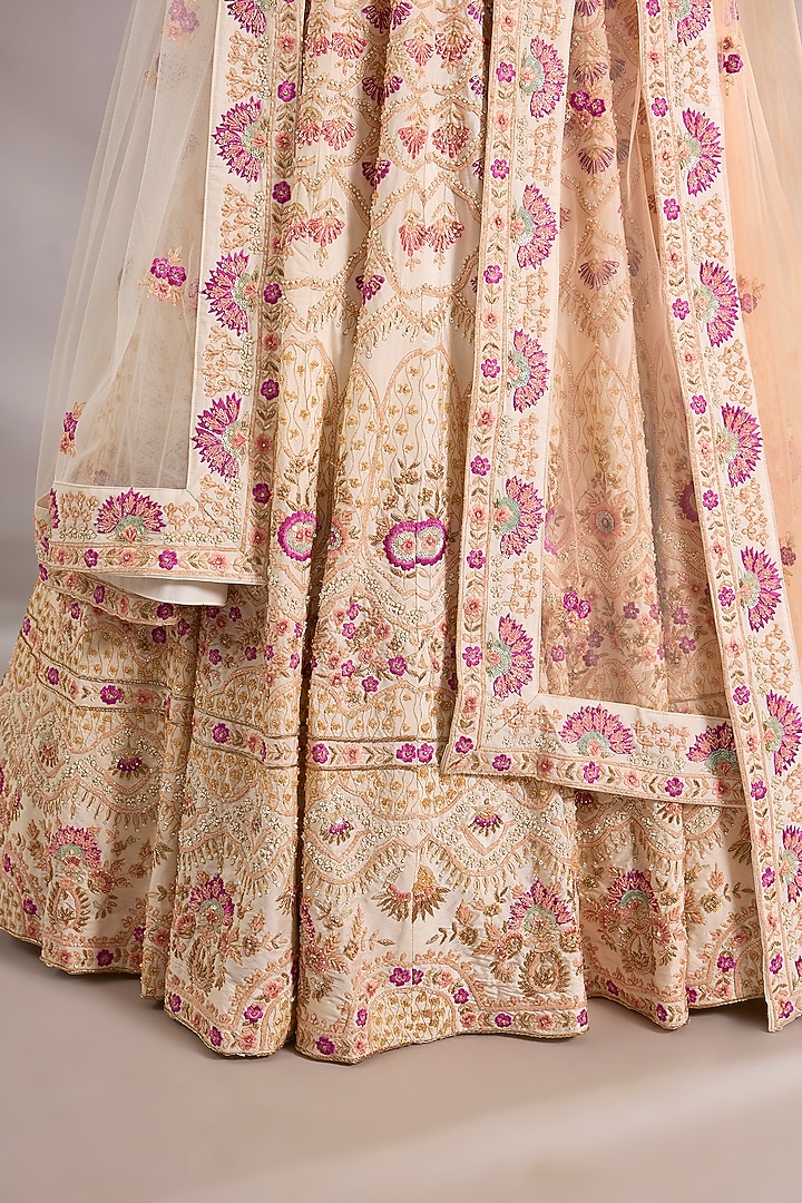 Ivory Raw Silk Embroidered Bridal Lehenga Set by Angad Singh at Pernia's Pop Up Shop