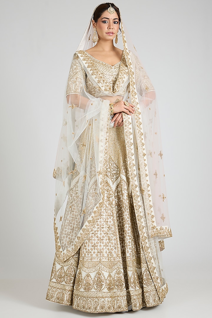 Ivory Raw Silk Embroidered Bridal Lehenga Set by Angad Singh at Pernia's Pop Up Shop