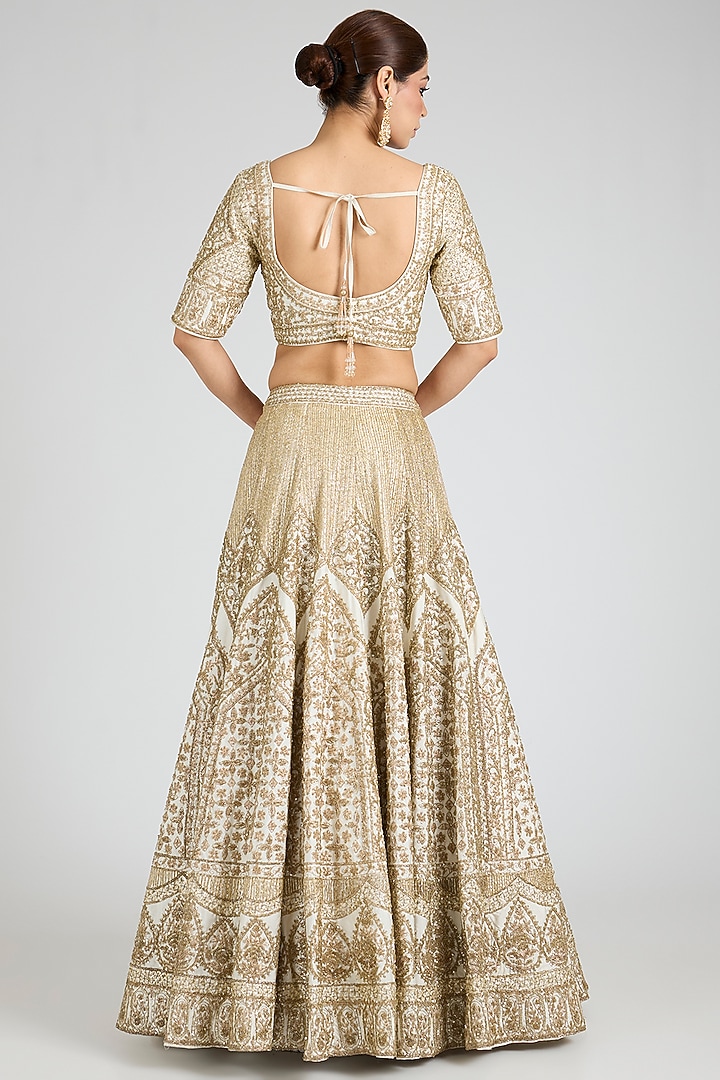 Ivory Raw Silk Embroidered Bridal Lehenga Set by Angad Singh at Pernia's Pop Up Shop