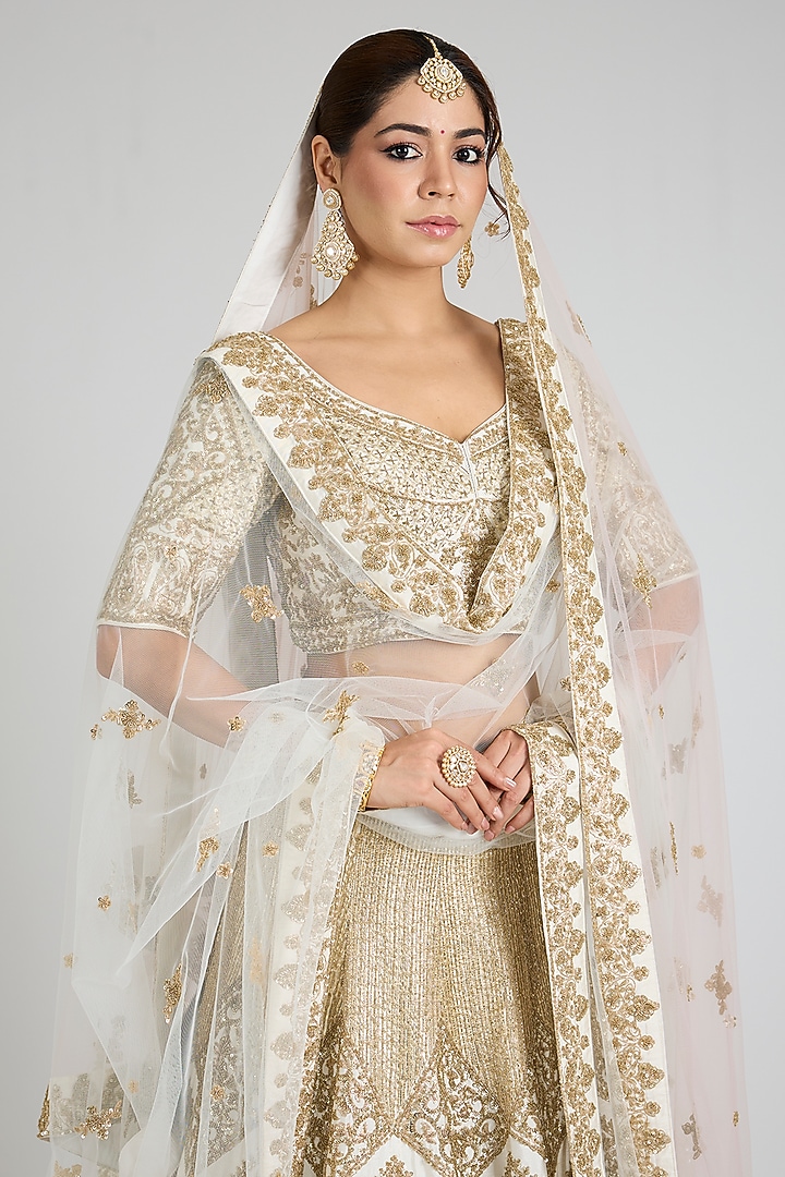 Ivory Raw Silk Embroidered Bridal Lehenga Set by Angad Singh at Pernia's Pop Up Shop