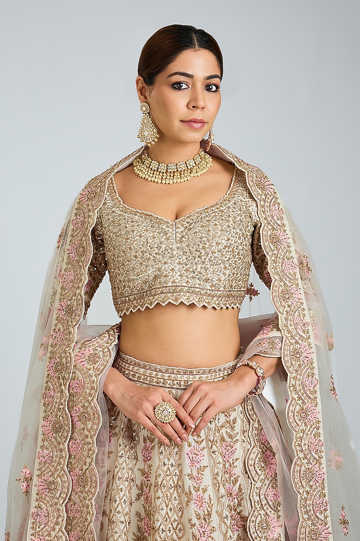 Ivory Raw Silk Embroidered Bridal Lehenga Set by Angad Singh at Pernia's Pop Up Shop