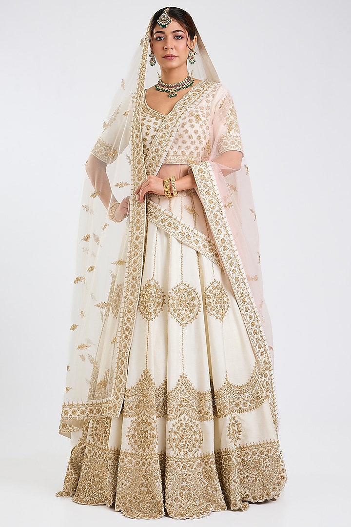 Ivory Raw Silk Embroidered Wedding Lehenga Set by Angad Singh at Pernia's Pop Up Shop