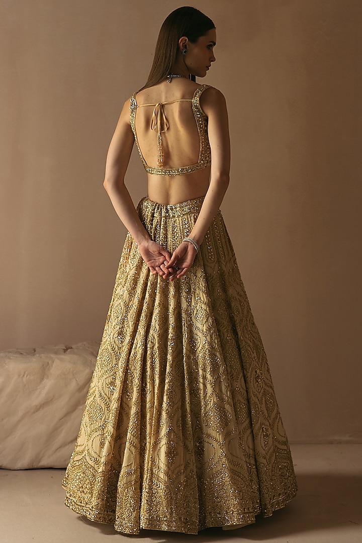 Champagne Gold Organza Sequins Embroidered Bridal Lehenga Set by Angad Singh at Pernia's Pop Up Shop