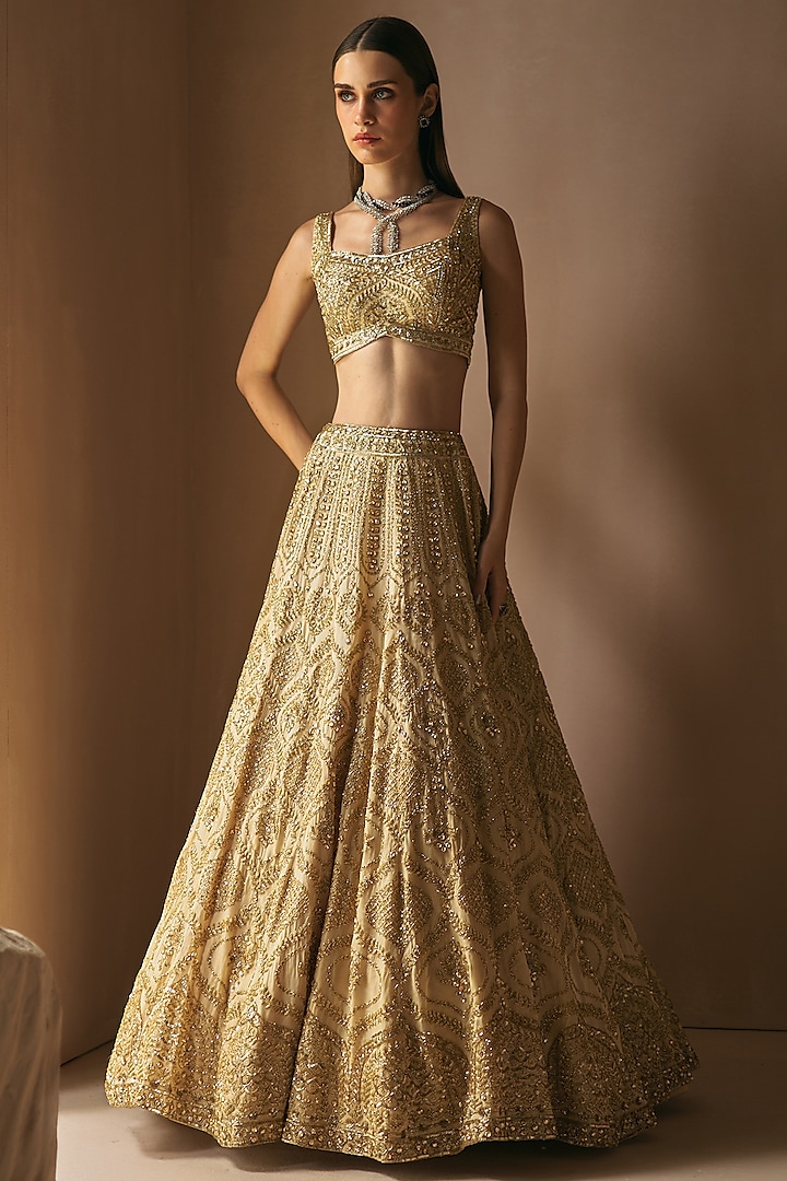 Champagne Gold Organza Sequins Embroidered Bridal Lehenga Set by Angad Singh at Pernia's Pop Up Shop