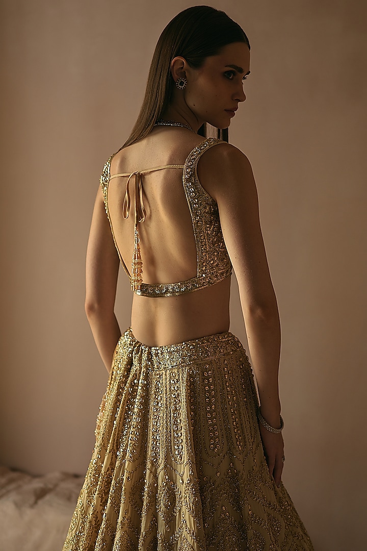 Champagne Gold Organza Sequins Embroidered Bridal Lehenga Set by Angad Singh at Pernia's Pop Up Shop