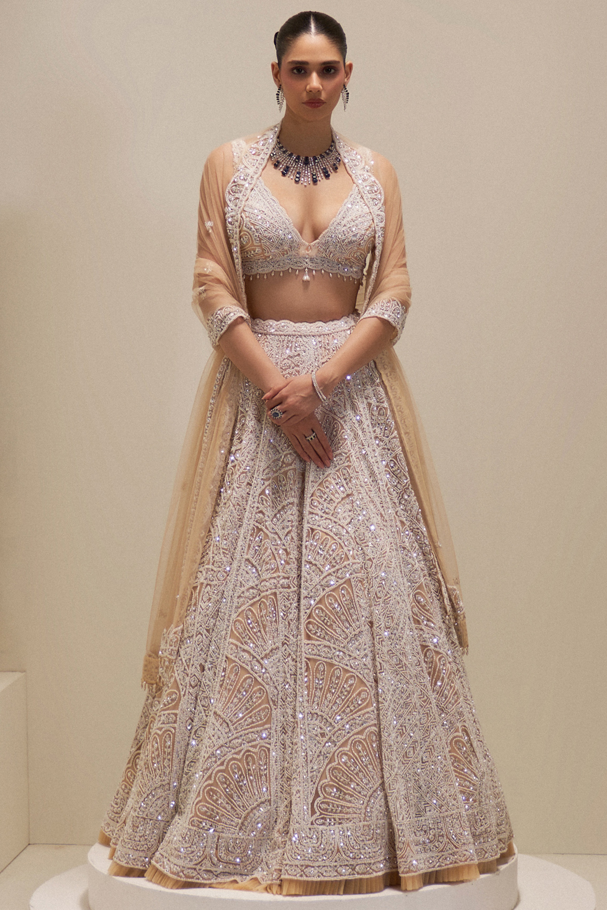 Ecru Net Sequins & Crystal Embroidered Bridal Lehenga Set by Angad Singh at Pernia's Pop Up Shop