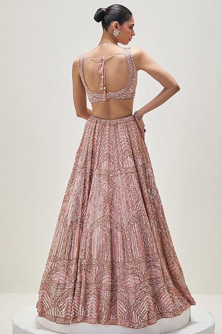 Peach Satin Organza Sequins Embroidered Bridal Lehenga Set by Angad Singh at Pernia's Pop Up Shop