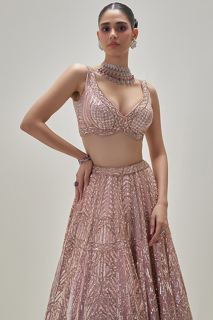 Peach Satin Organza Sequins Embroidered Bridal Lehenga Set by Angad Singh at Pernia's Pop Up Shop