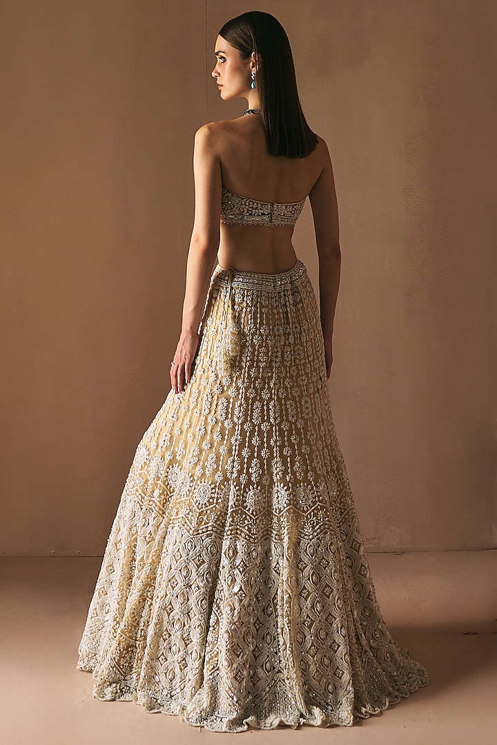 Ivory Net Cutdana & Mirror Embroidered Mermaid Bridal Lehenga Set by Angad Singh at Pernia's Pop Up Shop