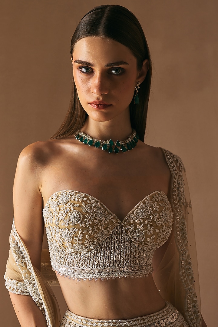 Ivory Net Cutdana & Mirror Embroidered Mermaid Bridal Lehenga Set by Angad Singh at Pernia's Pop Up Shop