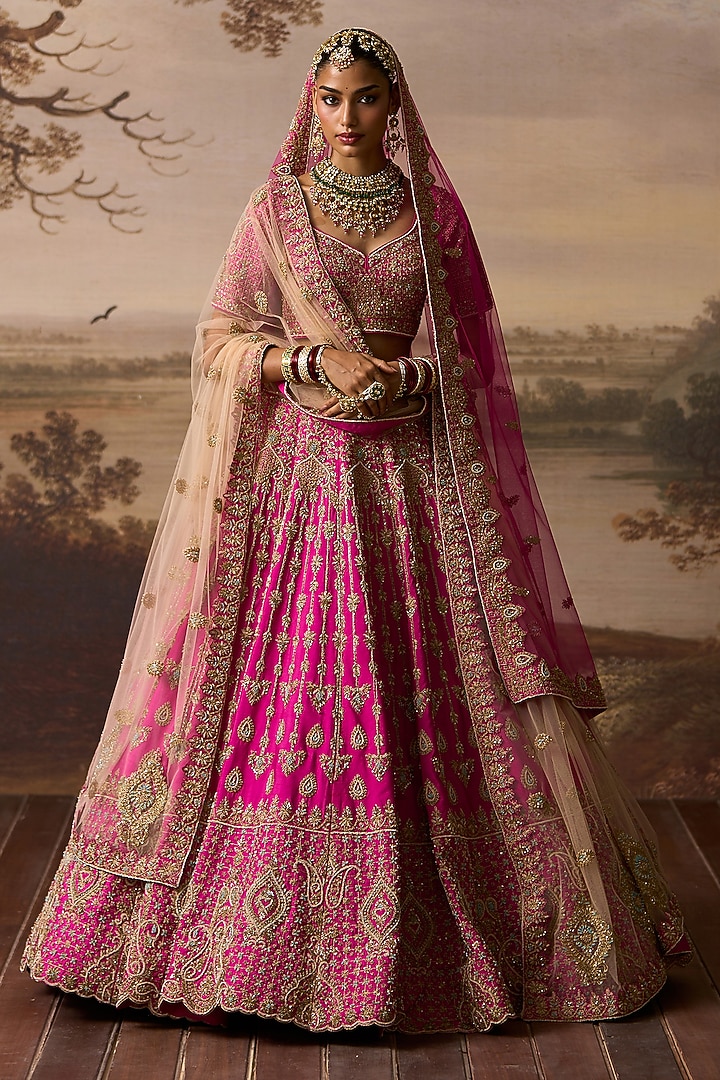 Rani Pink Raw Silk Paisley Embroidered Bridal Lehenga Set by Angad Singh at Pernia's Pop Up Shop