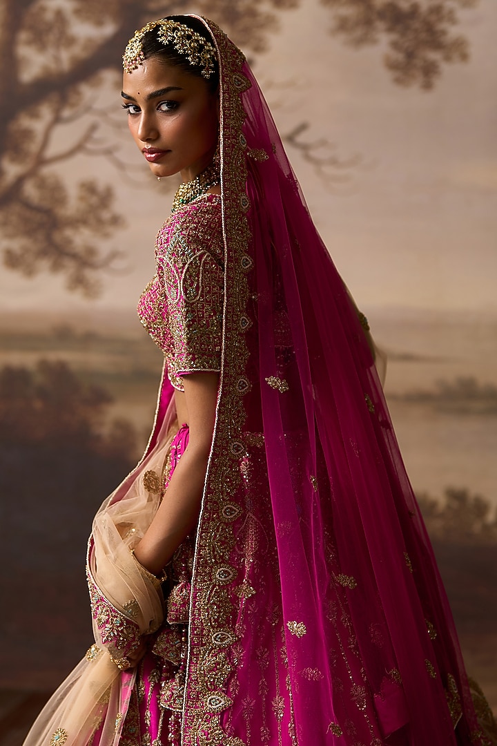 Rani Pink Raw Silk Paisley Embroidered Bridal Lehenga Set by Angad Singh at Pernia's Pop Up Shop