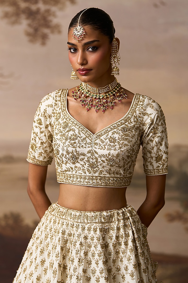 Ivory Raw Silk Nakshi Embroidered Bridal Lehenga Set by Angad Singh at Pernia's Pop Up Shop