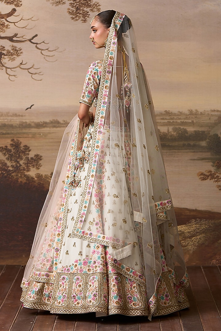 Ivory Raw Silk Resham Embroidered Bridal Lehenga Set by Angad Singh at Pernia's Pop Up Shop