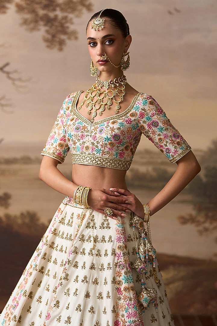 Ivory Raw Silk Resham Embroidered Bridal Lehenga Set by Angad Singh at Pernia's Pop Up Shop