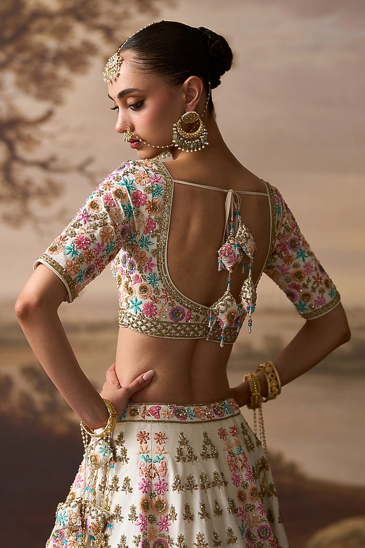 Ivory Raw Silk Resham Embroidered Bridal Lehenga Set by Angad Singh at Pernia's Pop Up Shop