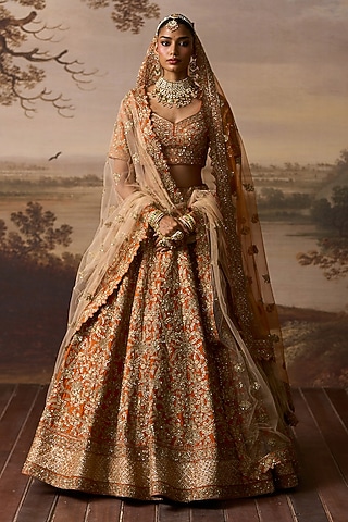 Rust Raw Silk Embroidered Lehenga Set by Angad Singh